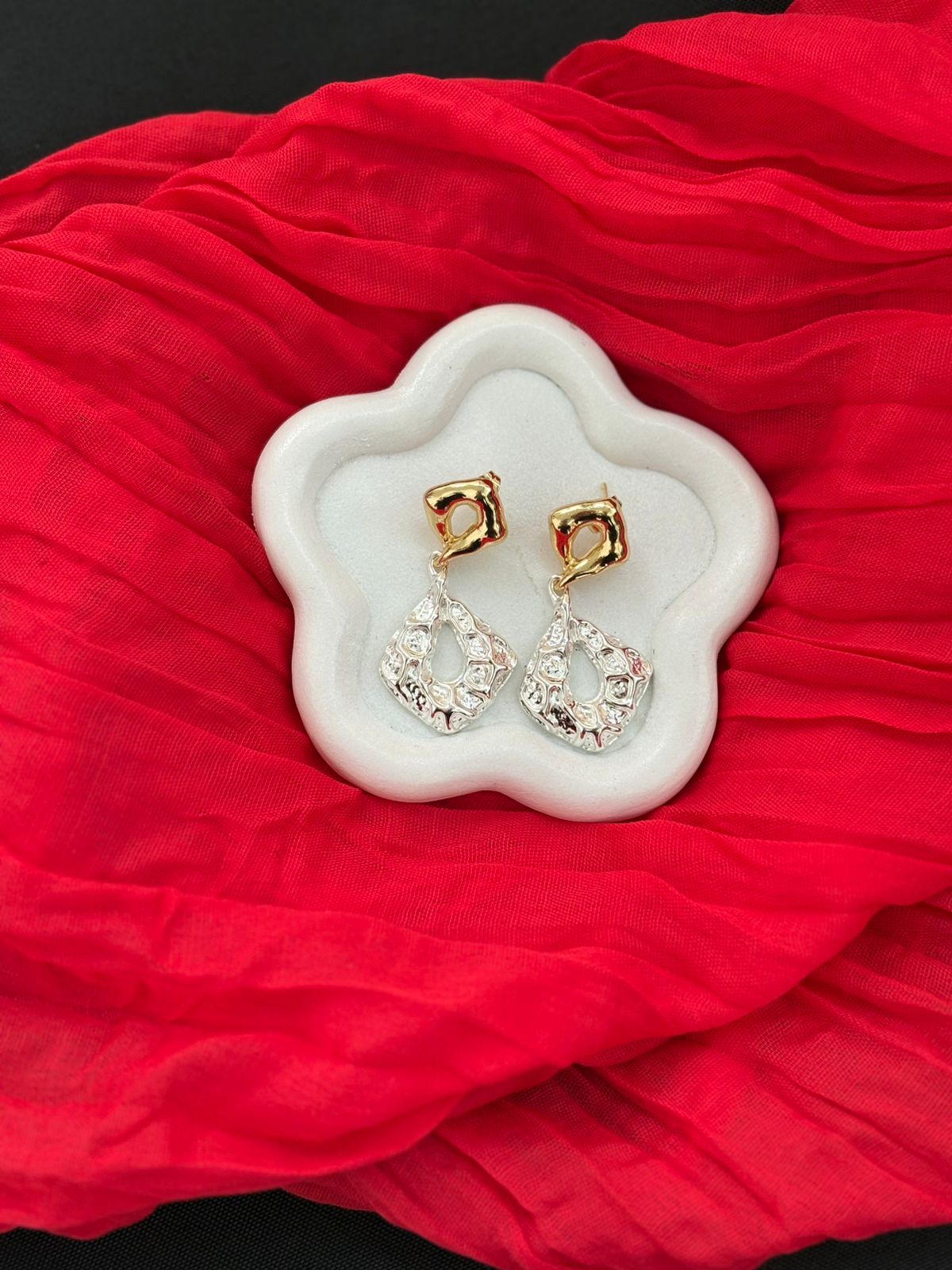 Silver and gold earrings