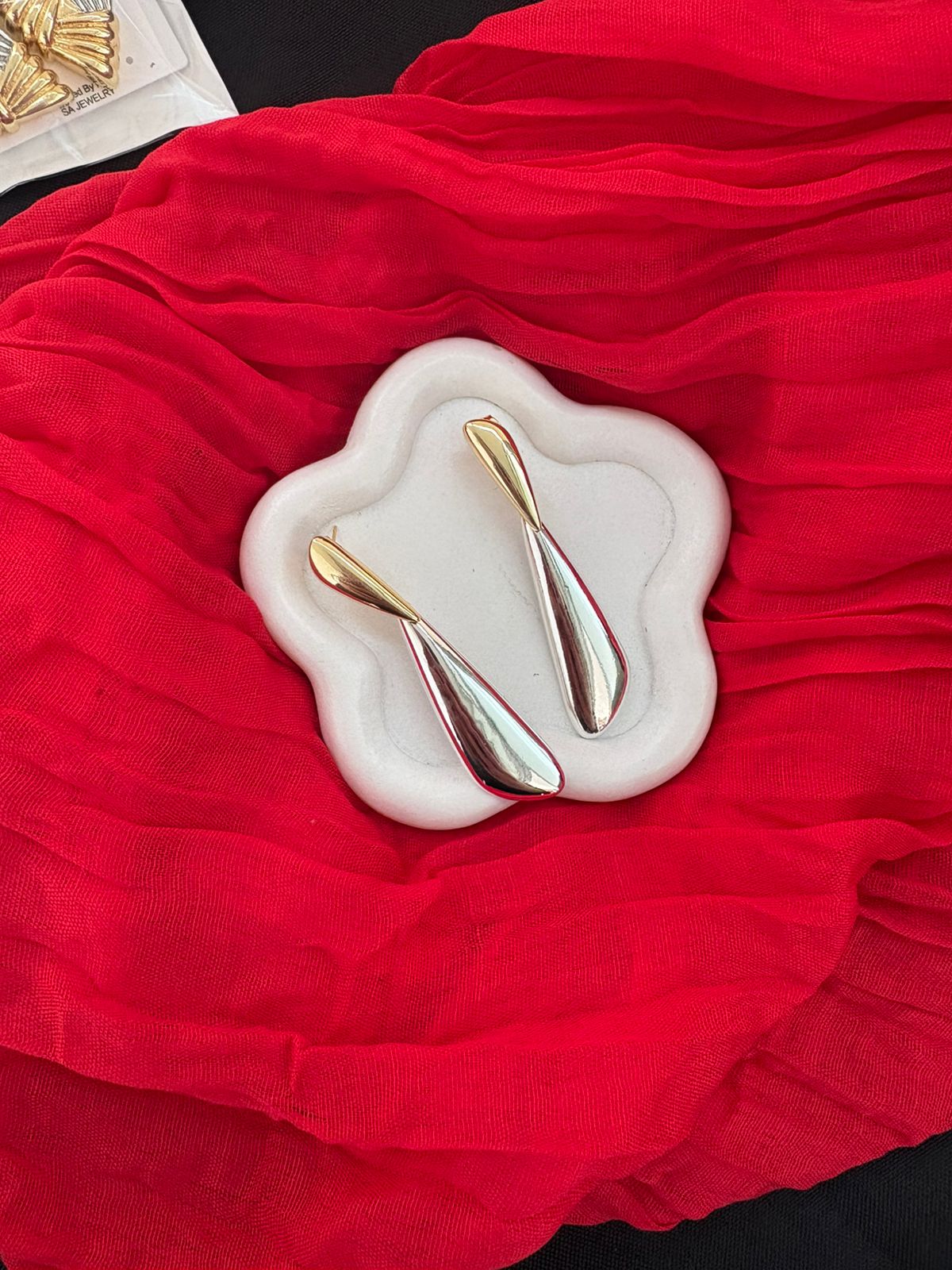 Silver and gold earrings