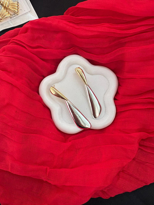 Silver and gold earrings